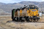 UP SD40Ns #1720 + 1633 lead the southbound Cache Valley Local approaching the 5400 S. Road Xing in Franklin, ID.  March 24, 2021